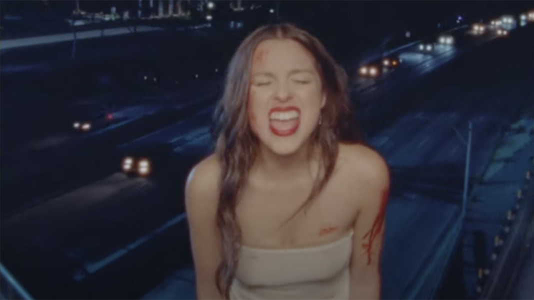 Olivia Rodrigo Is Bloody and on the Run in New 'Vampire' Music Video
