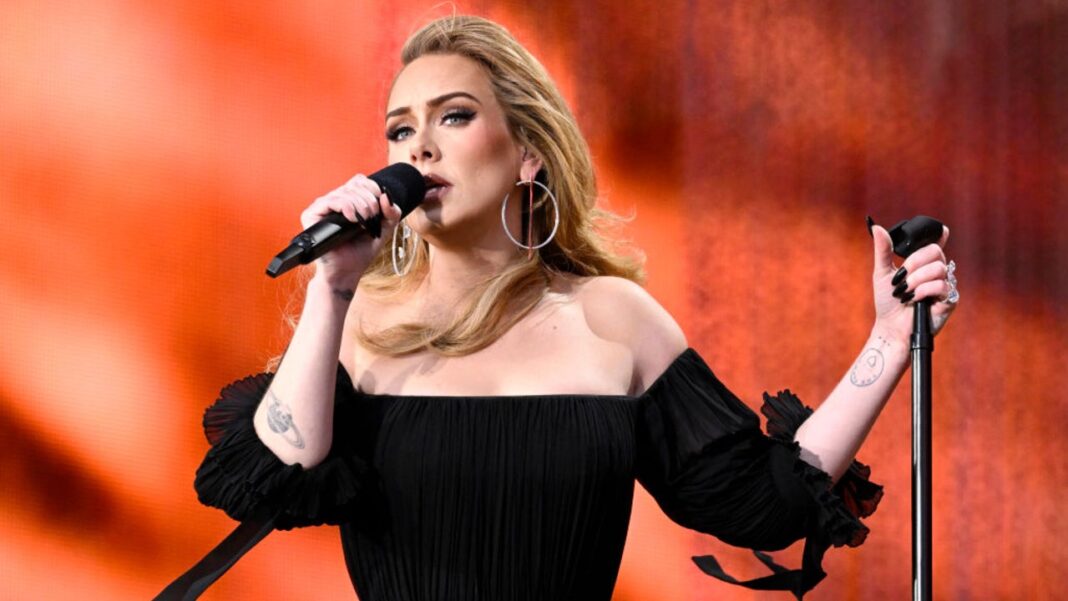 Adele Jokes 'I'll F**king Kill' Fans Who Throw Things On Stage