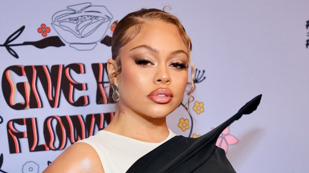 Latto Threatens Fan After They Try Throwing Object at Her on Stage