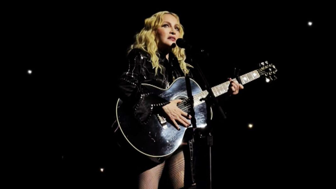 Madonna Takes a Tumble Onstage After She's Dropped By a Dancer 