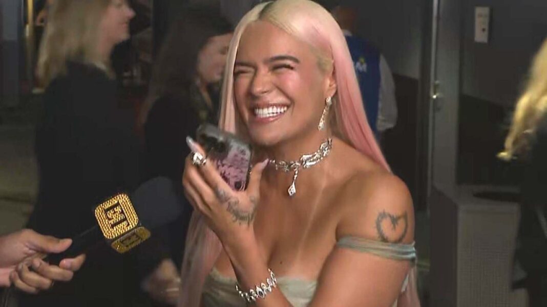 Watch Karol G Call Her Dad After First-Ever GRAMMY Win (Exclusive)